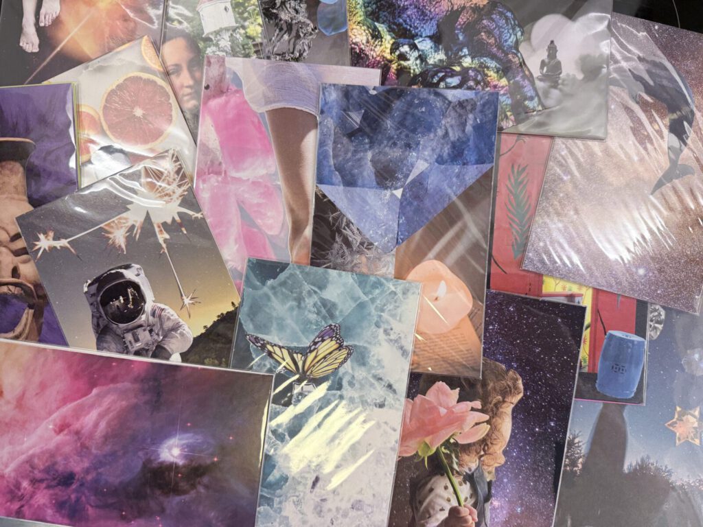 Finished SoulCollage cards spread across a table, each made from collaged magazine images